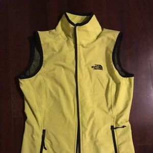 North face.  Bright yellow vest
